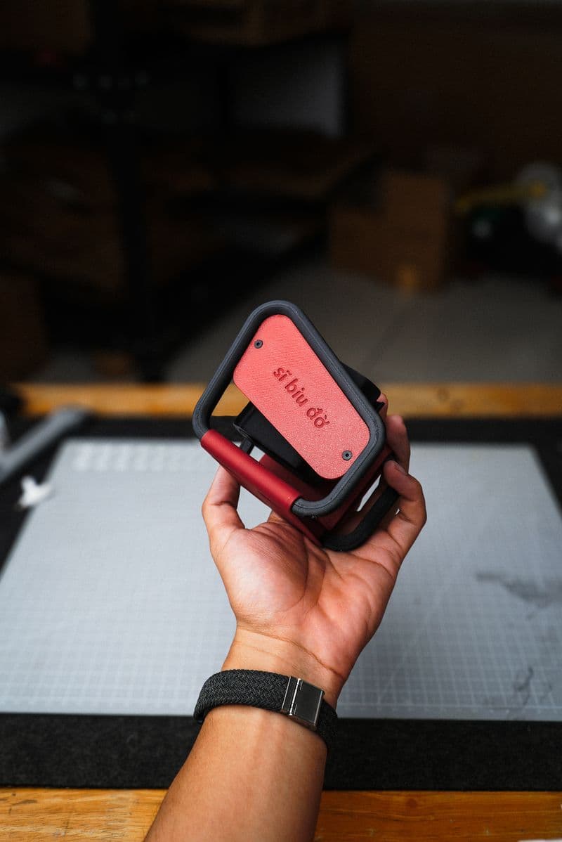 Red version of handheld fan dock